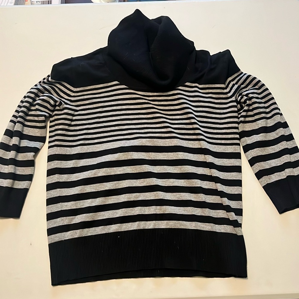 Size medium. Black and gray loose neck turtle neck.